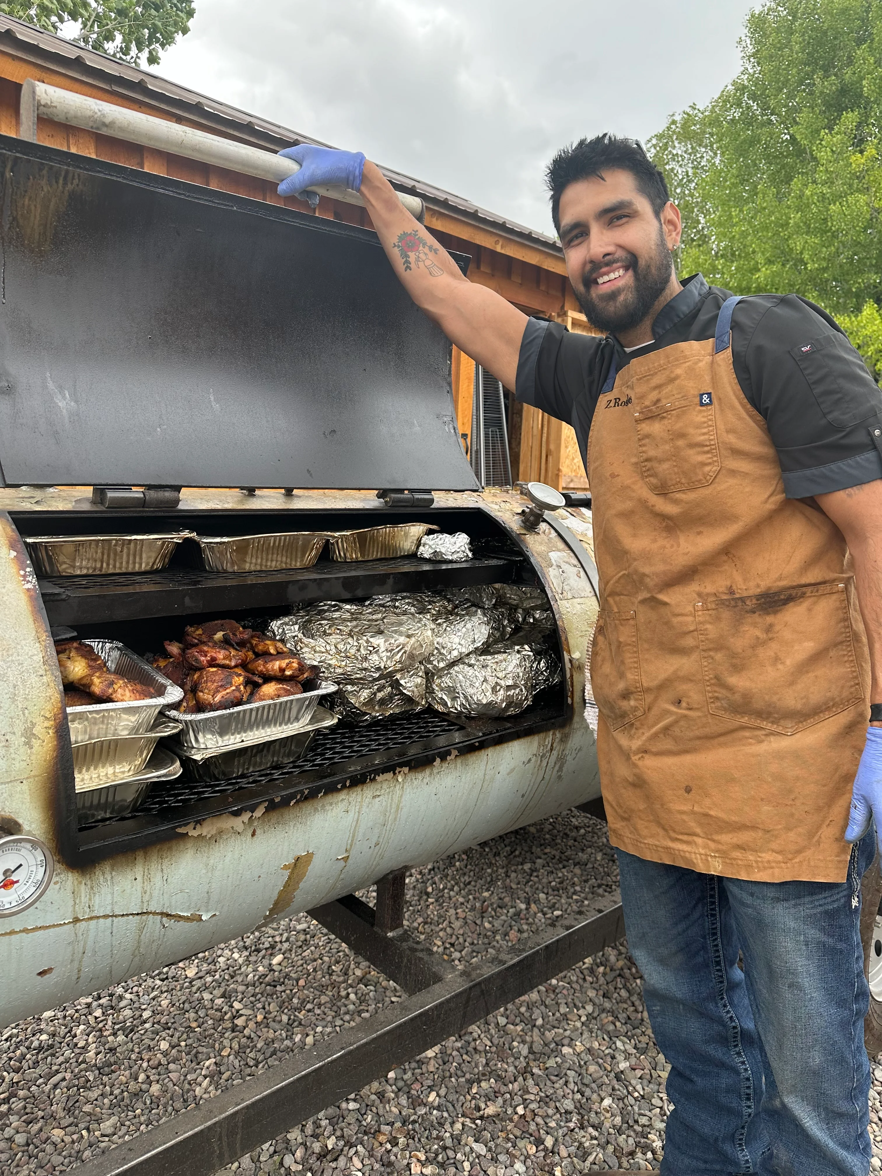Grilling barbecue chicken in a smoker