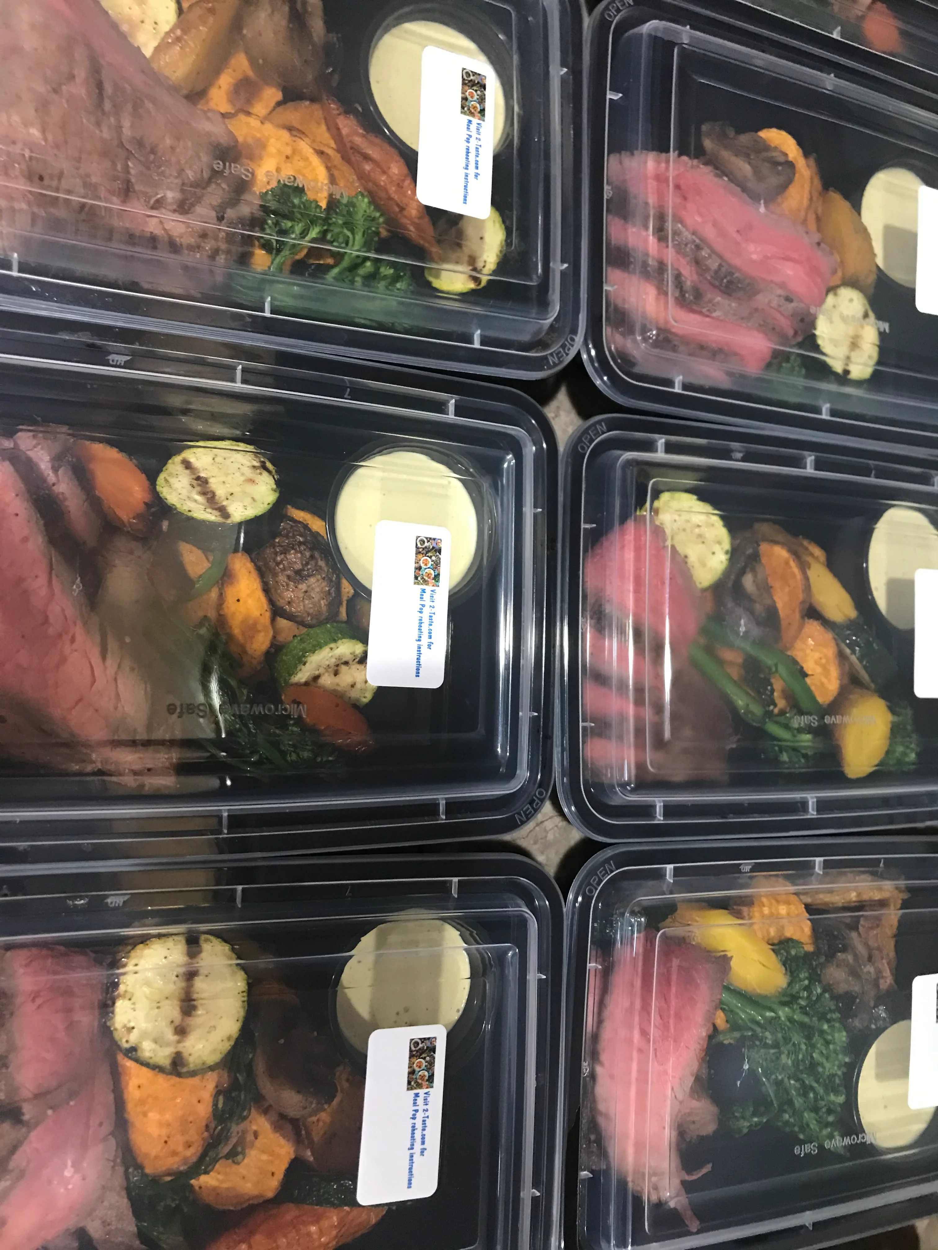 Grilled steak meal prep boxes with seasonal vegetables