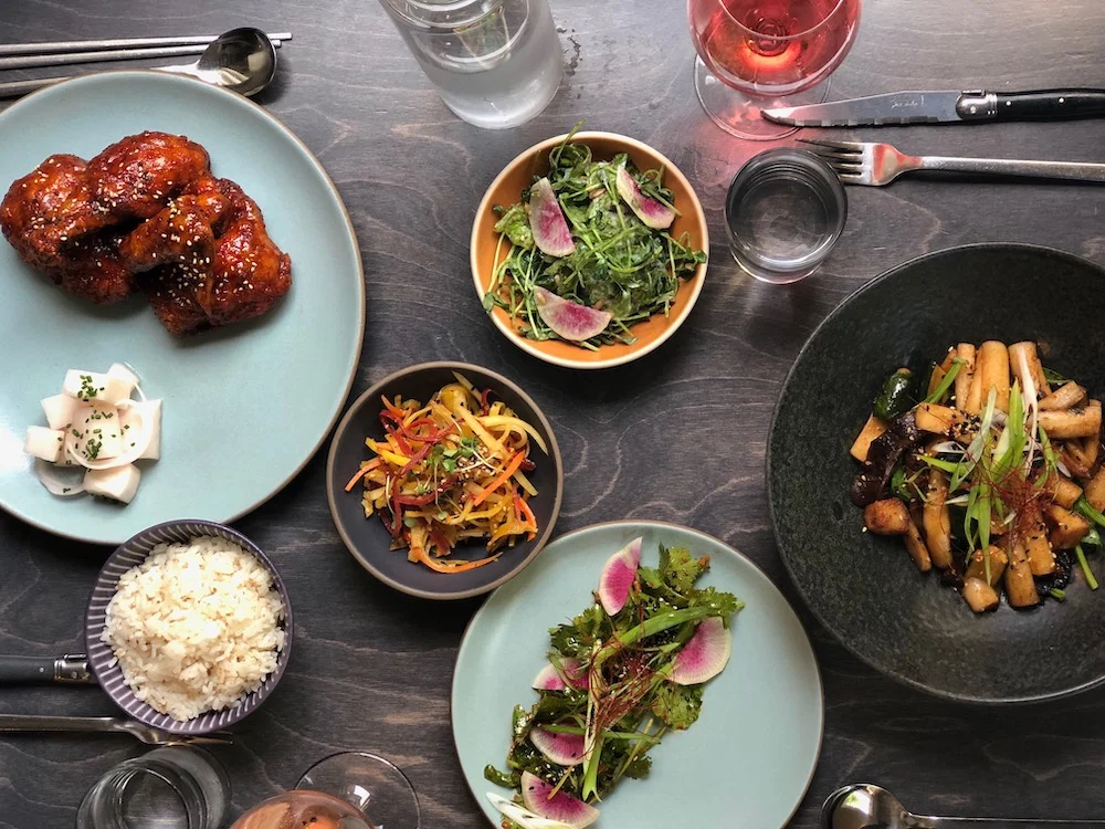 Miss Kim table full of seasonal dishes