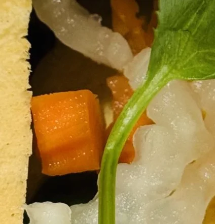 A restaurant chef preparing a dish