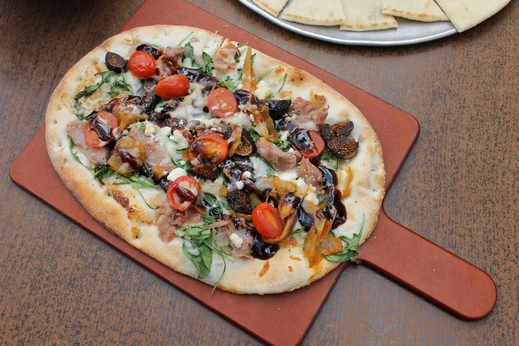 Gourmet flatbread pizza with fresh toppings