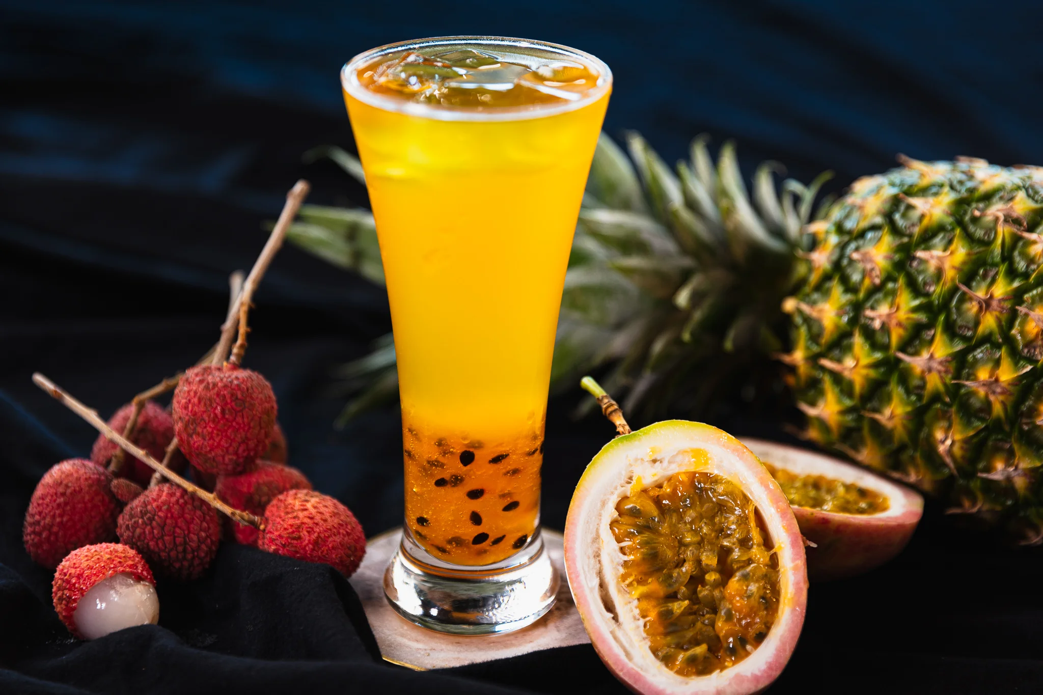 Tropical fruit cocktail with passion fruit and lychee