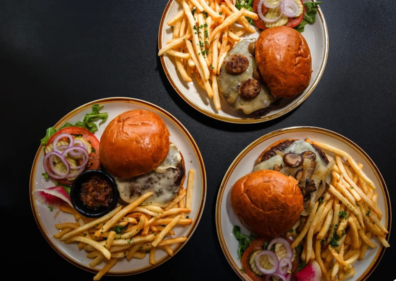 Classic American cheeseburgers with fries