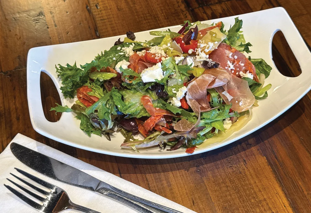 Mediterranean mixed salad with prosciutto and feta