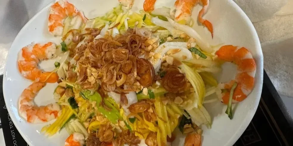 Vietnamese shrimp salad with fresh herbs and crispy shallots