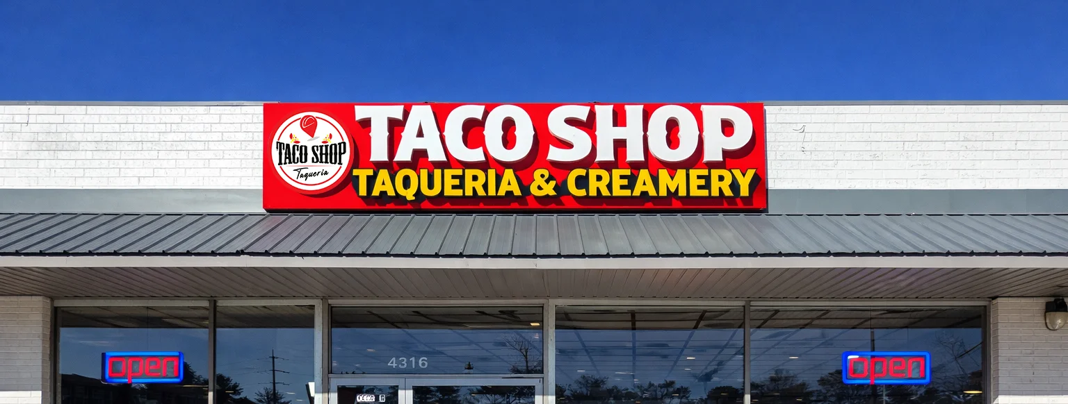 Taco Shop exterior with open sign and bright signage