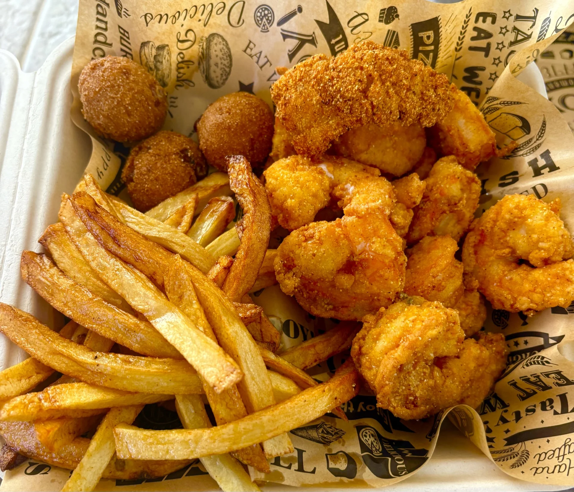 Southern fried shrimp with fries and hushpuppies