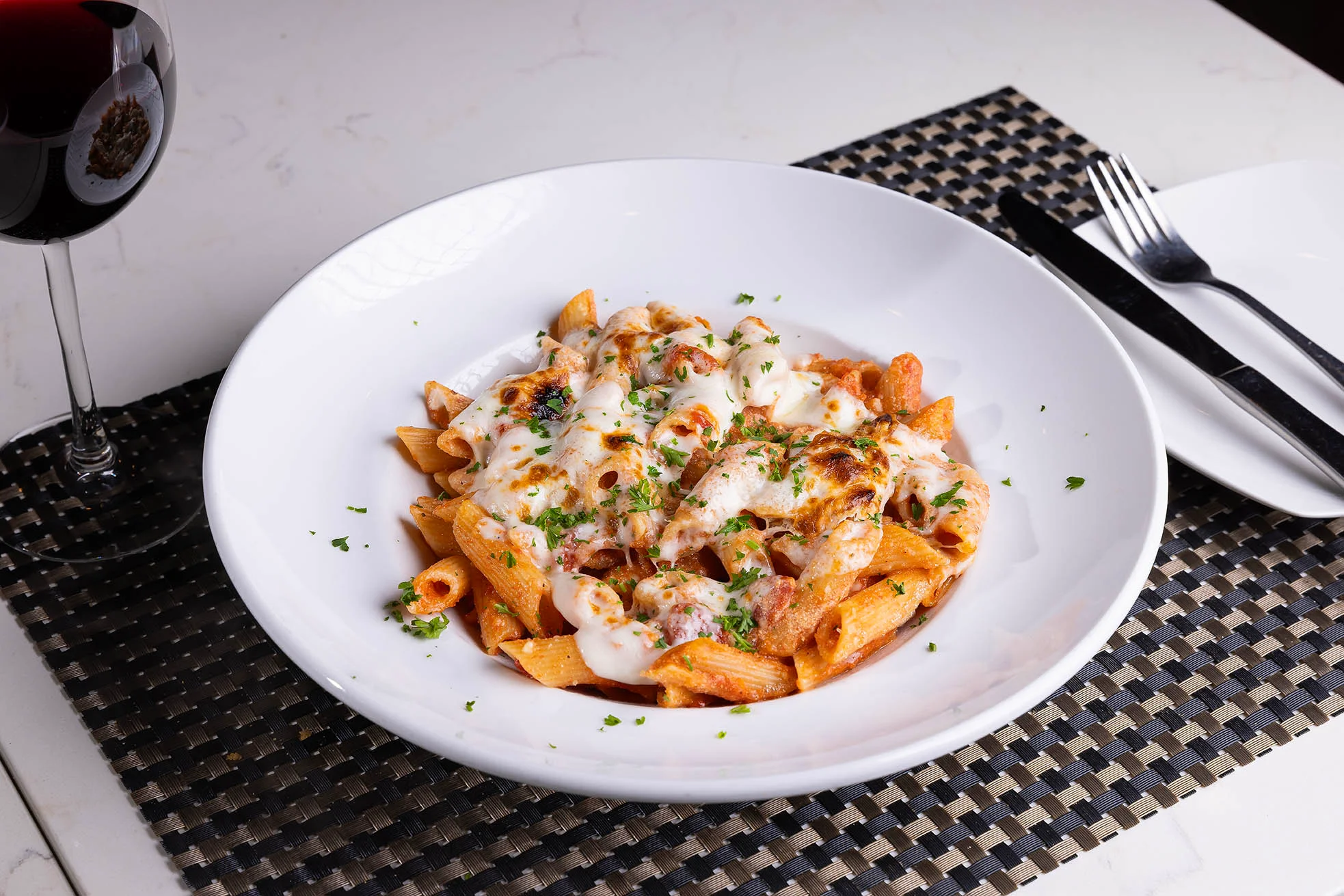 Cucina red pasta paired with red wine