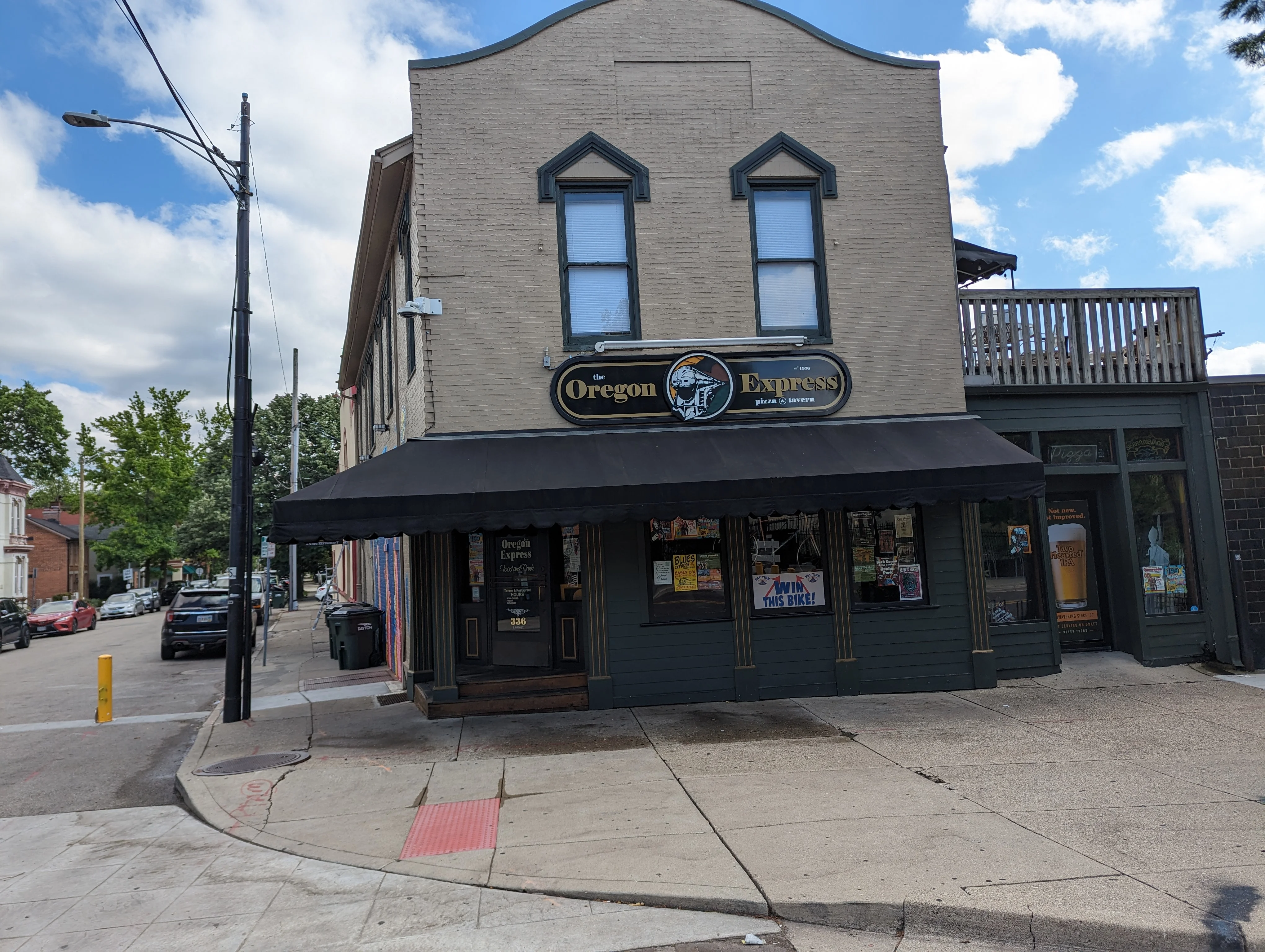 Exterior view of Oregon Express pizza tavern in a charming neighborhood