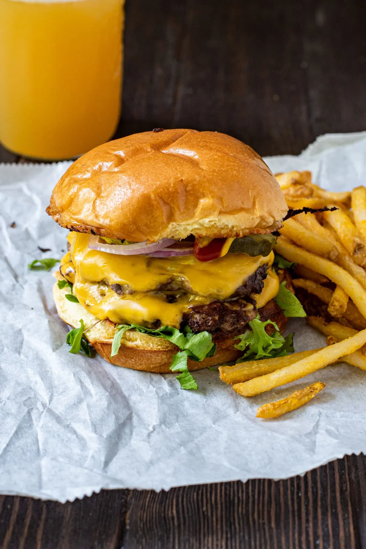Juicy cheeseburger with fries, a classic American diner meal