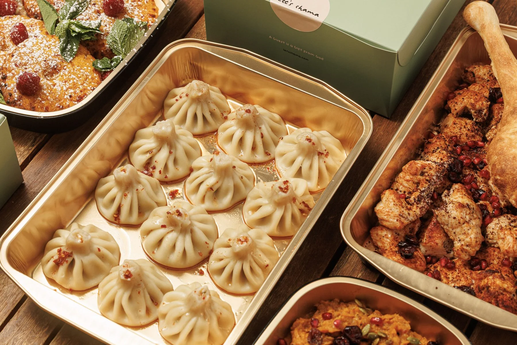 Catering trays of khinkali and Georgian dishes