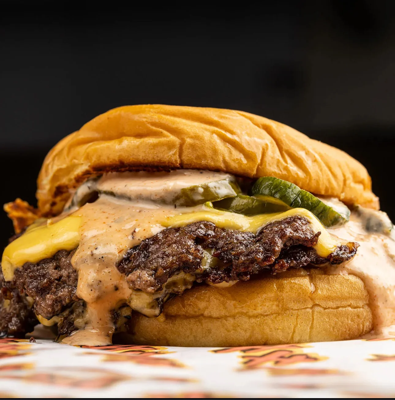 Juicy cheeseburger with special sauce and pickles