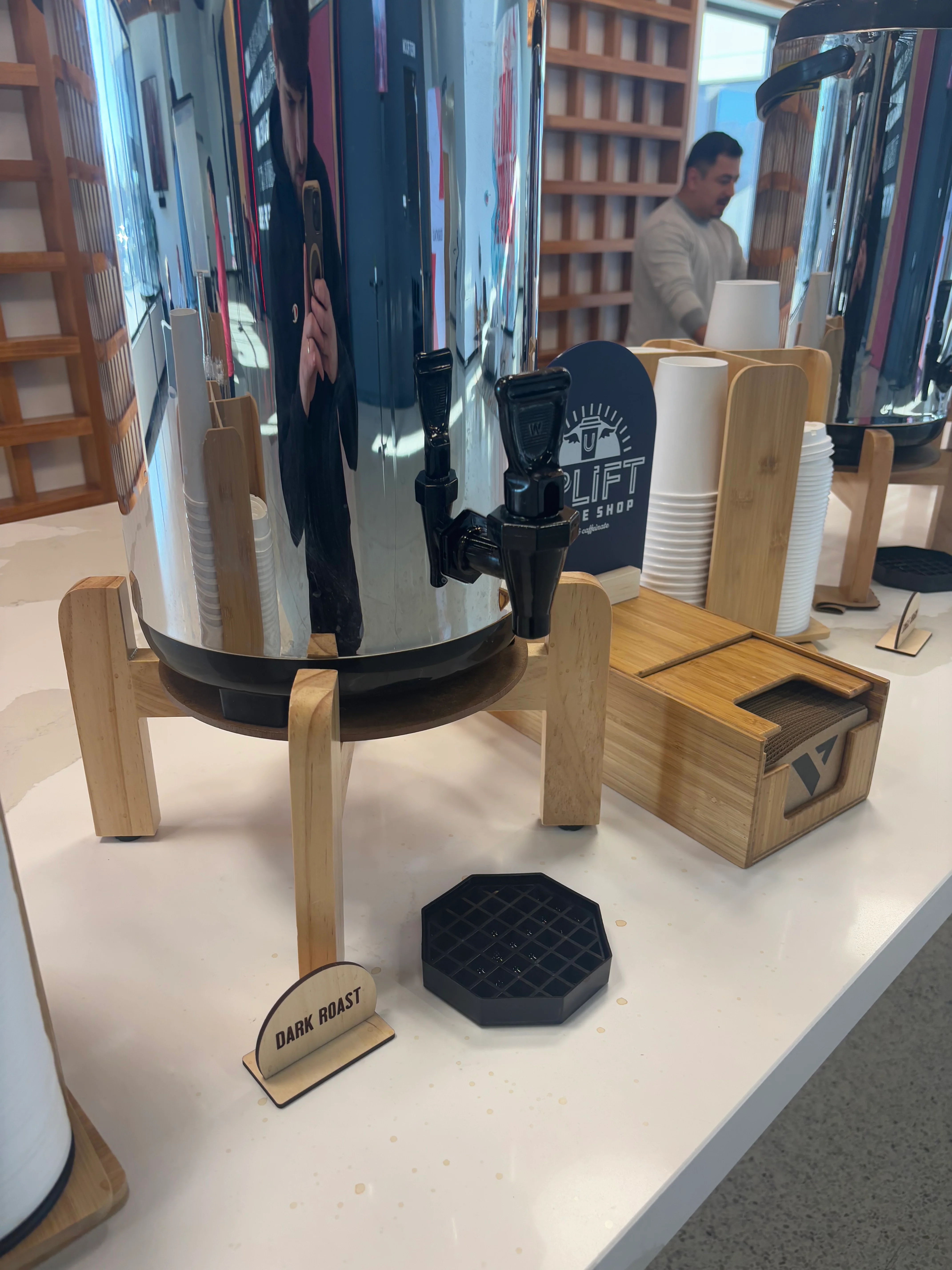 Coffee station with dark roast coffee dispenser and bamboo accessories
