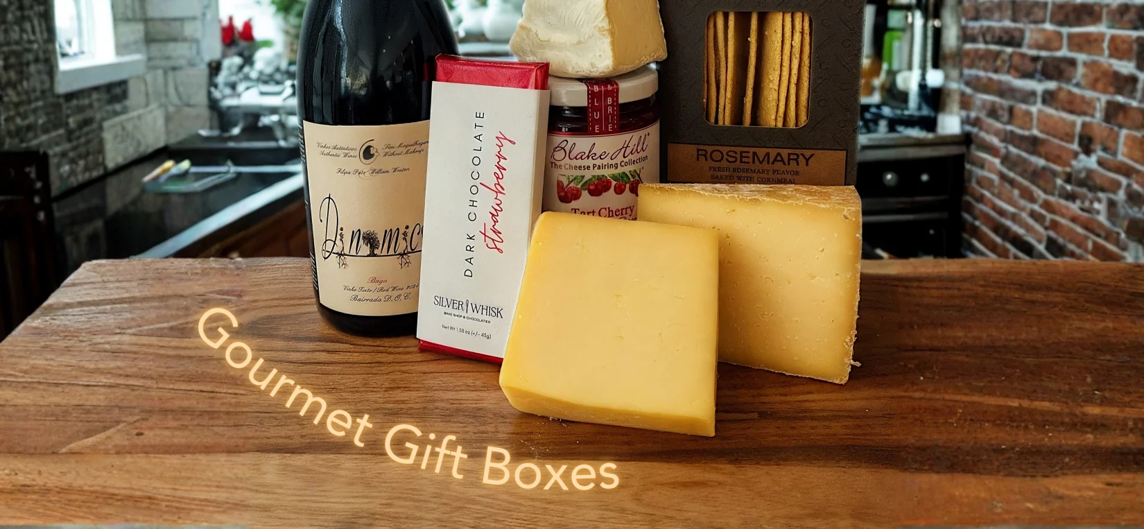 Gourmet gift box with wine, cheese, and crackers