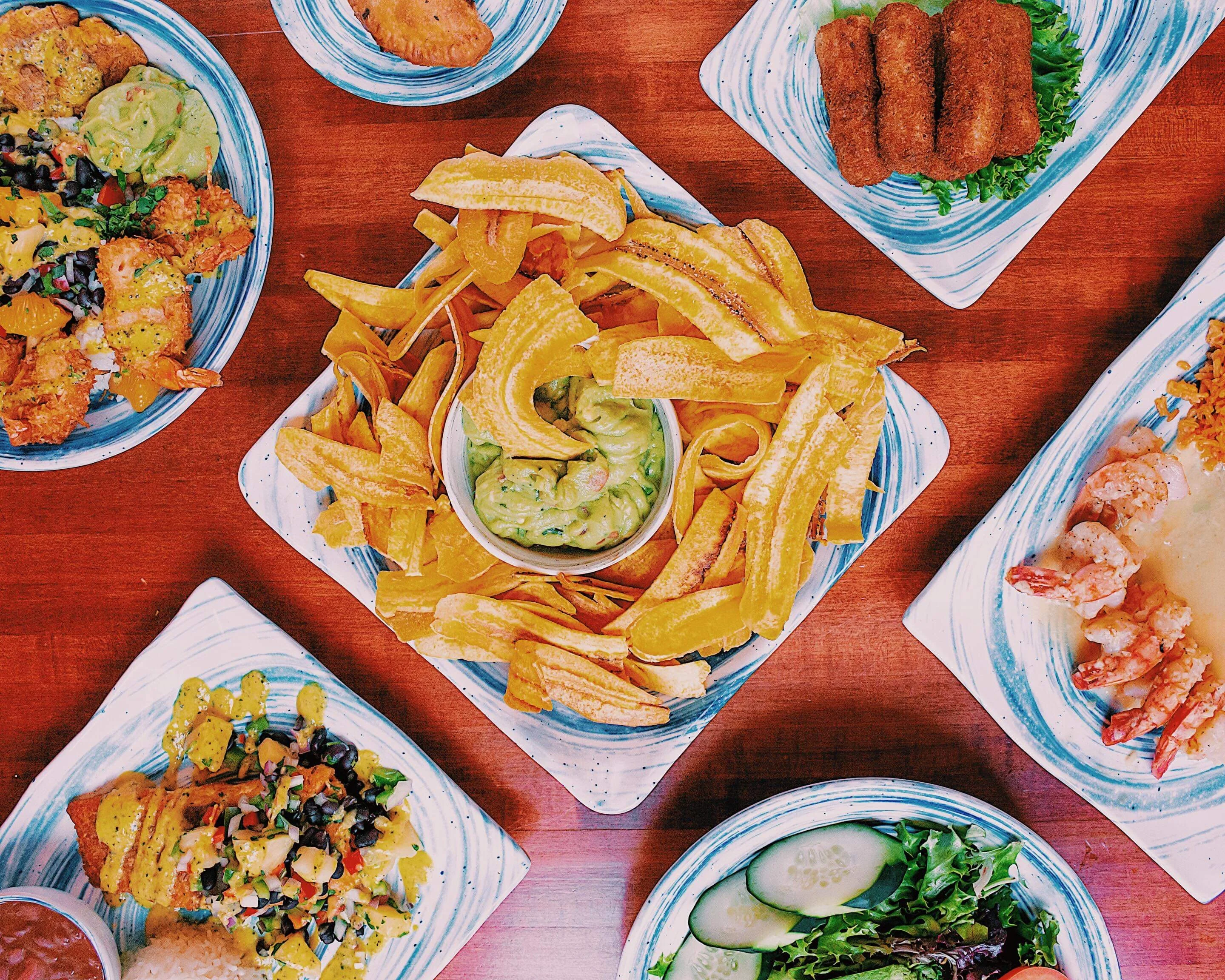 Crispy plantain chips with guacamole in a Latin American restaurant