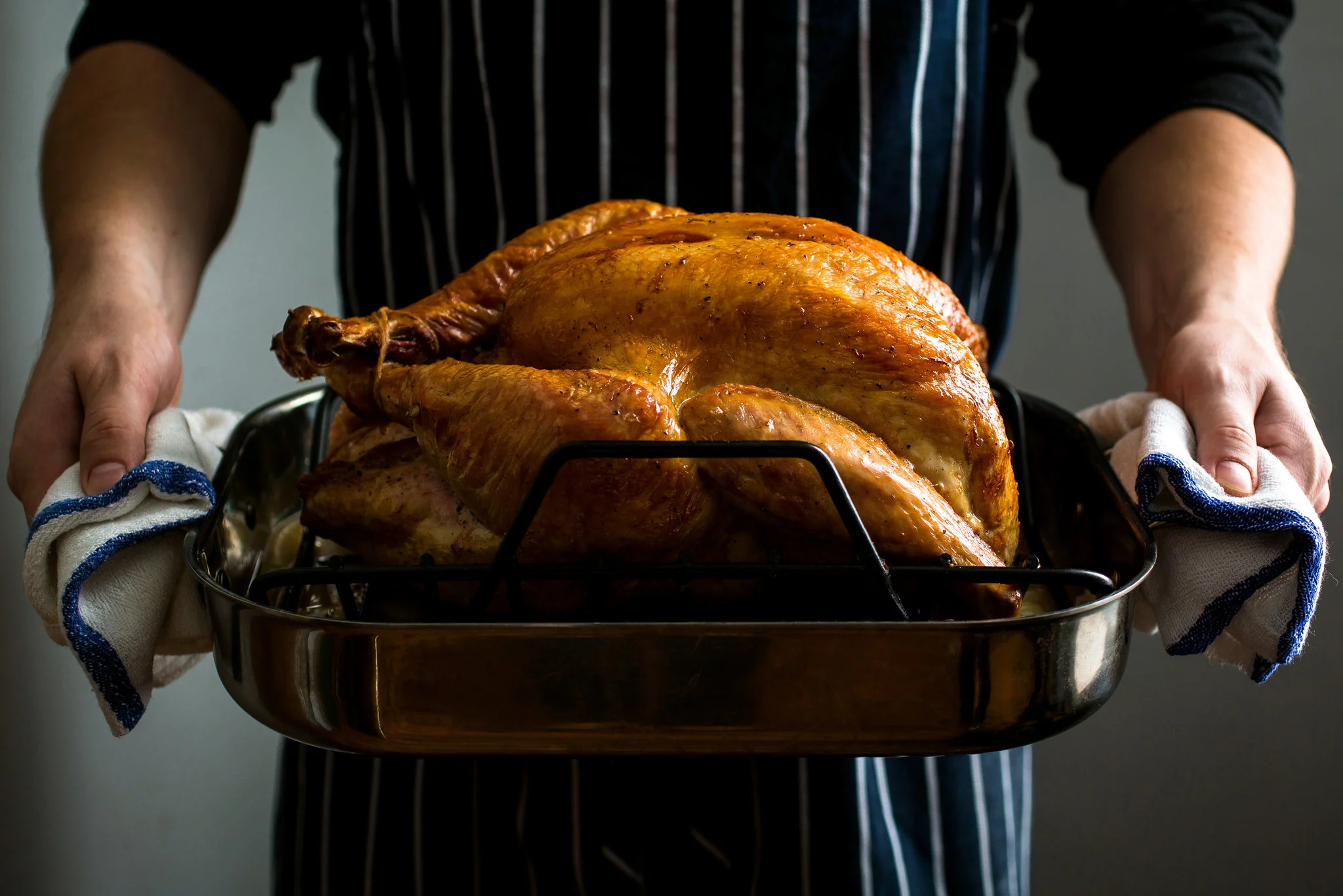 Golden roasted turkey on a serving tray
