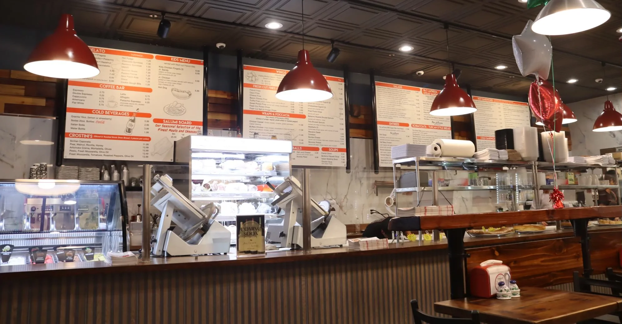 Cozy restaurant interior with menu boards and warm lighting