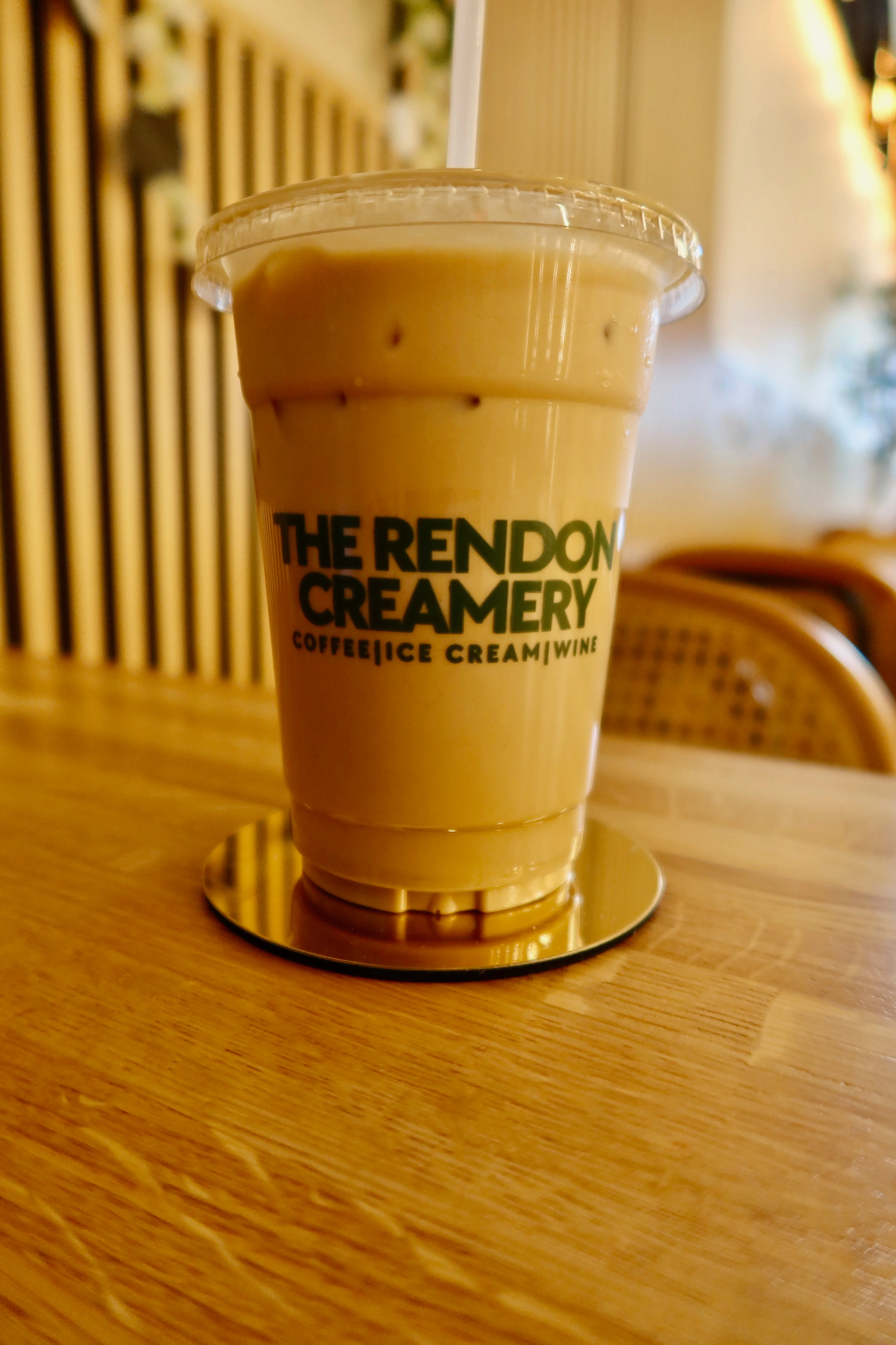 Iced coffee drink in a stylish café setting
