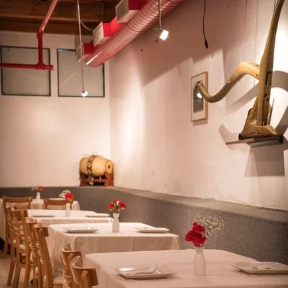 Cozy restaurant interior with wooden tables and rustic decor