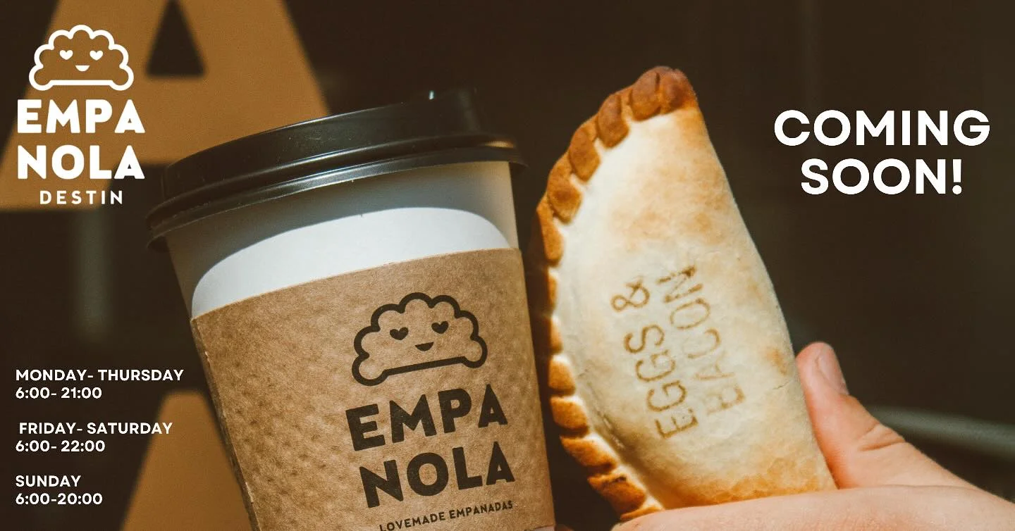 A cup of coffee and a freshly baked empanada labeled 'EGGS & BACON', ready to be enjoyed. The background indicates a business announcement.
