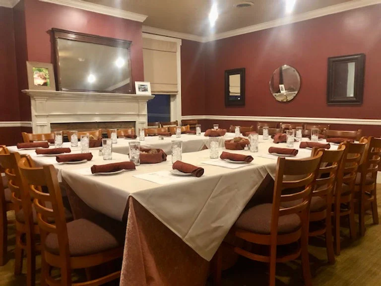 Cozy restaurant dining area with elegant table settings