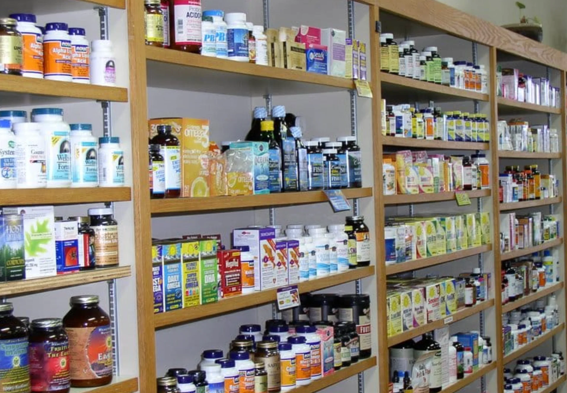 Shelves stocked with various health supplements and vitamins
