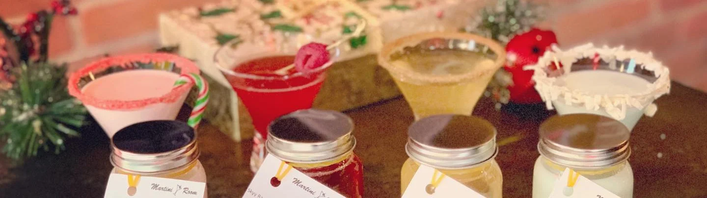 Colorful cocktails and dessert jars on a festive table