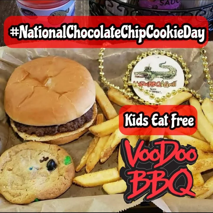 Classic American cheeseburger with fries and a chocolate chip cookie