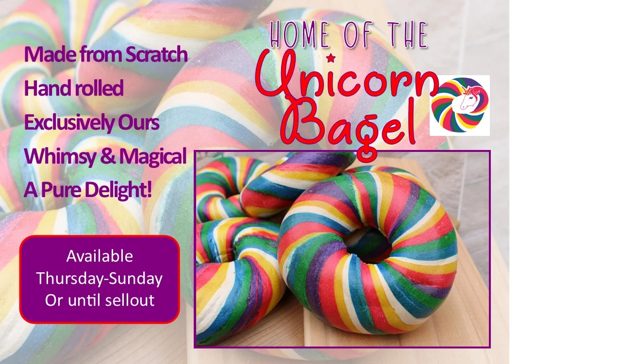 Colorful unicorn bagel with rainbow swirls