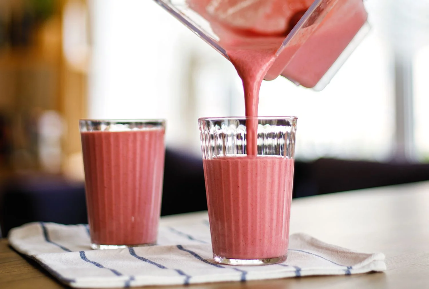 Refreshing strawberry smoothie in glasses