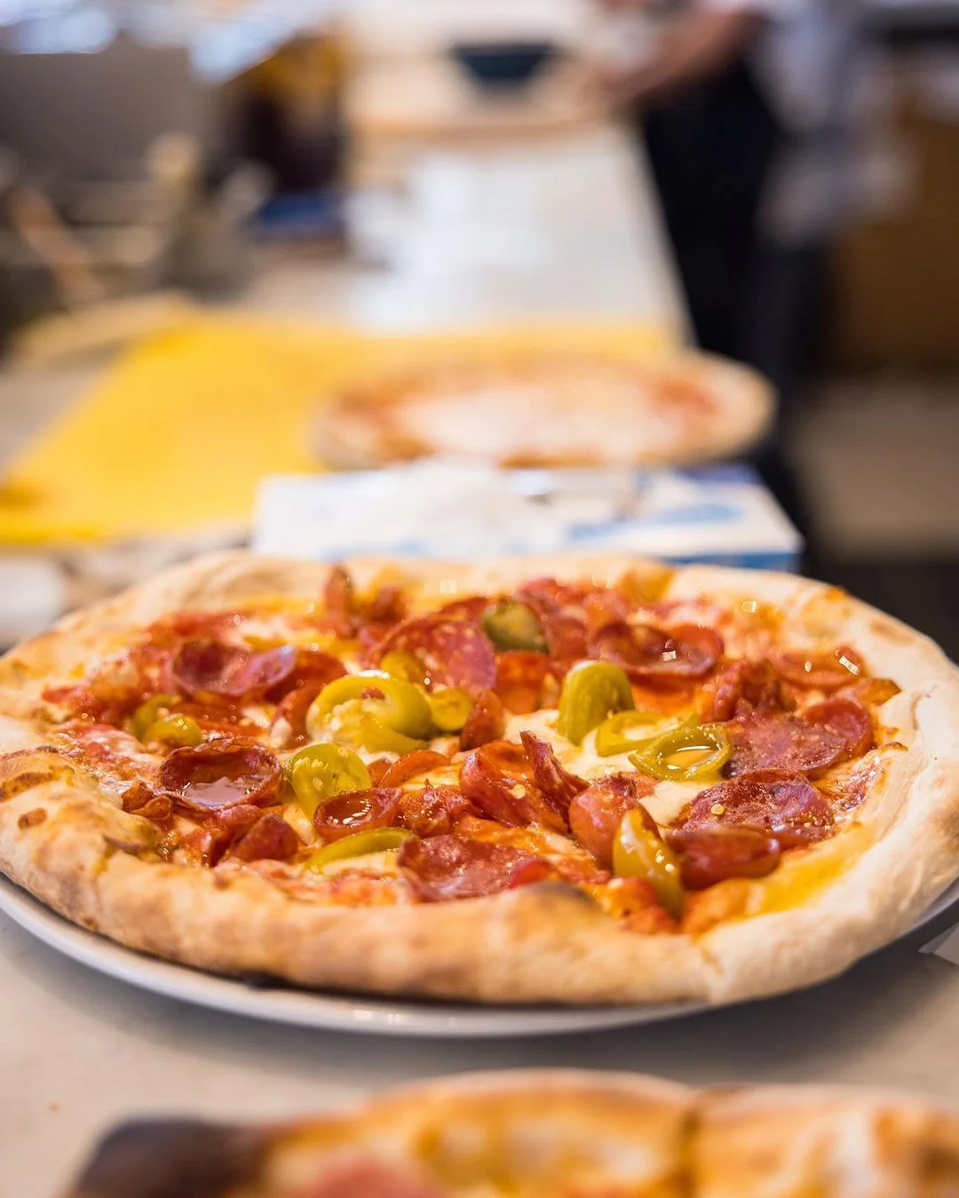 Pepperoni pizza with jalapeños from a pizzeria