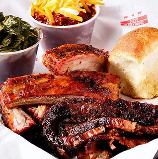 Smoky Texas-style barbecue ribs with sides