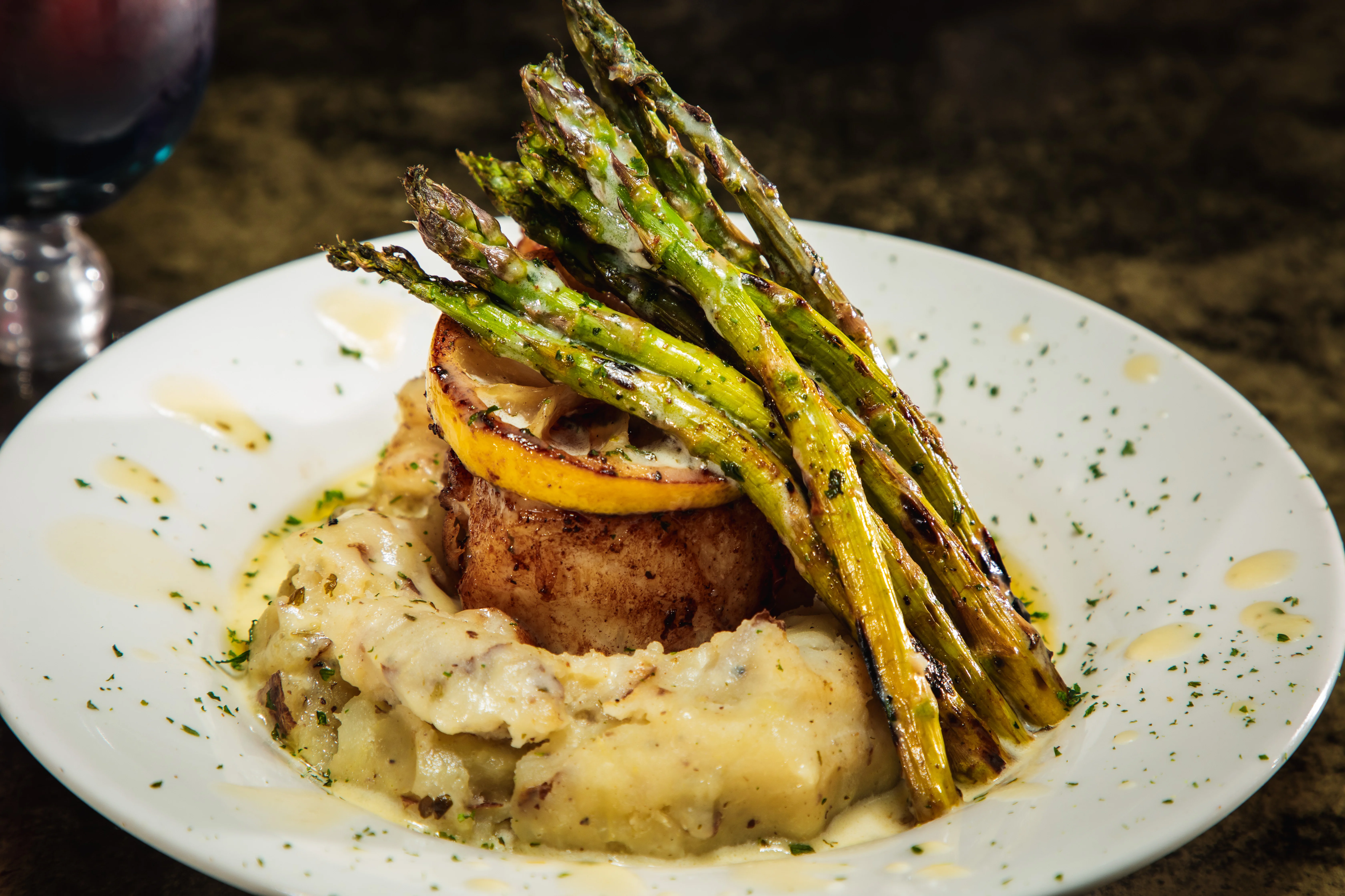 Grilled lemon chicken with mashed potatoes and asparagus
