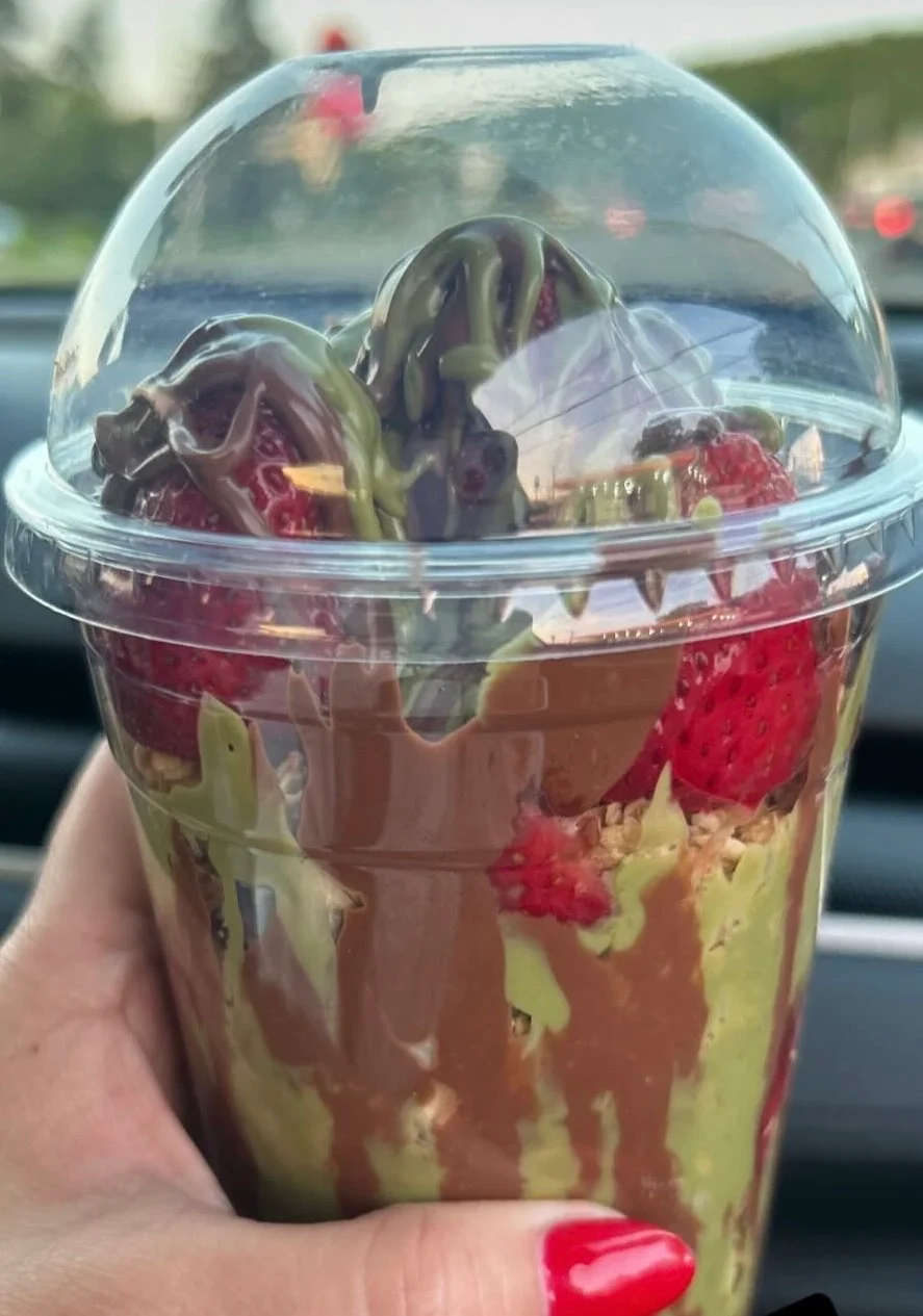 Delicious chocolate and matcha parfait with strawberries