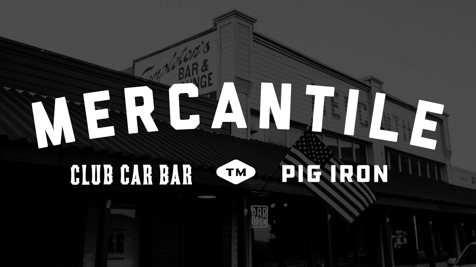 Exterior view of Mercantile restaurant with American flag
