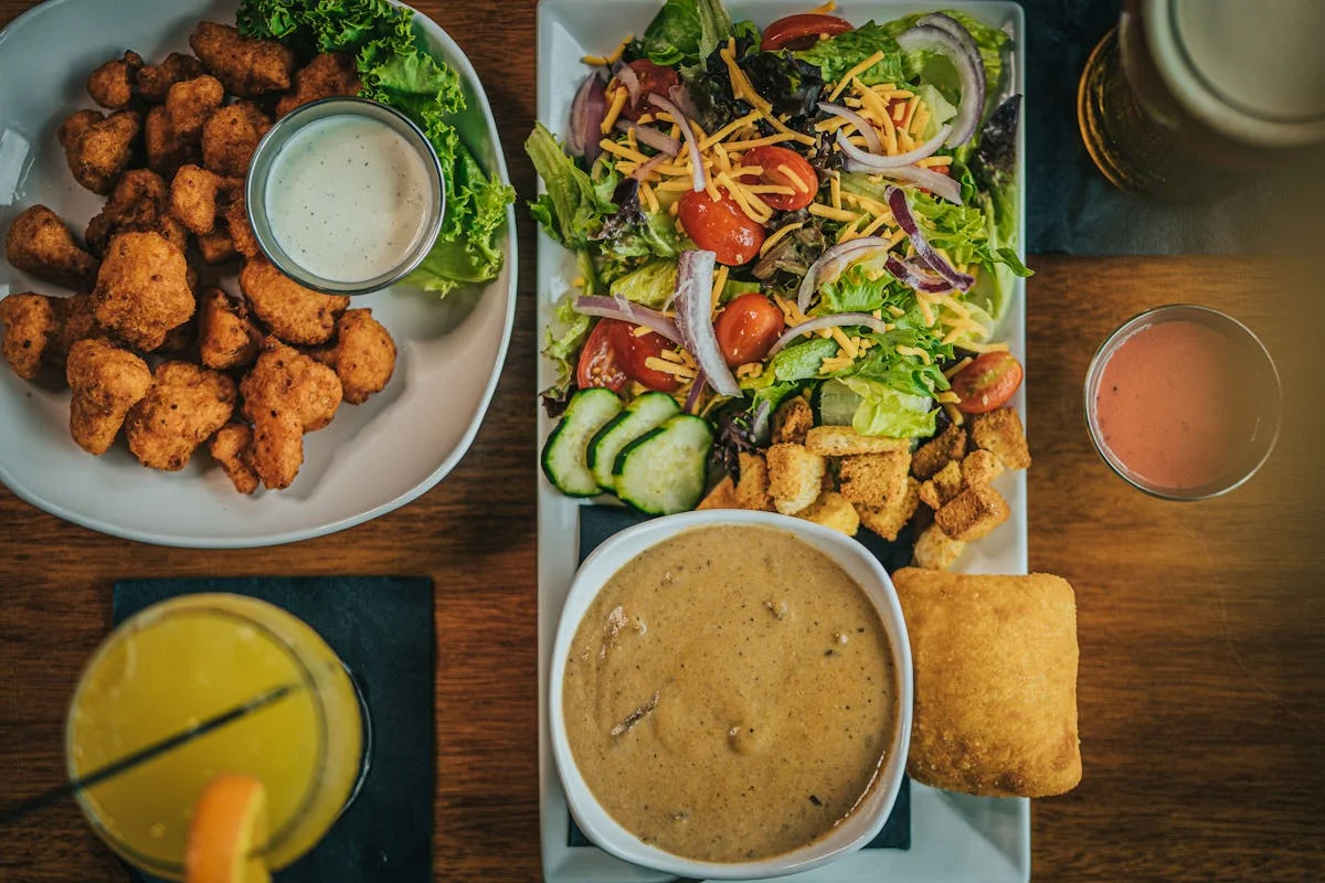 Southern-style fried catfish with sides and salad