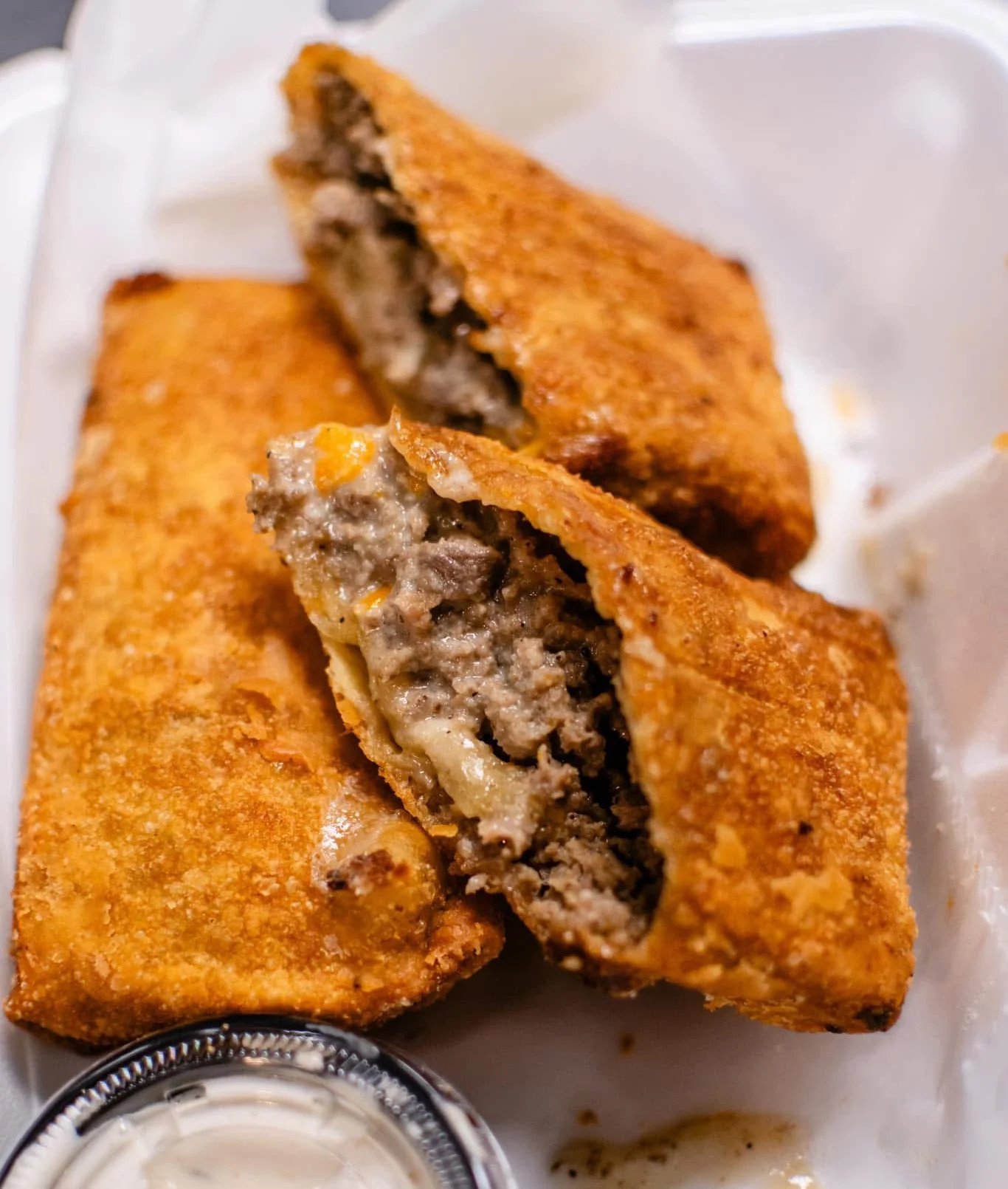 Crispy fried beef empanadas with dipping sauce