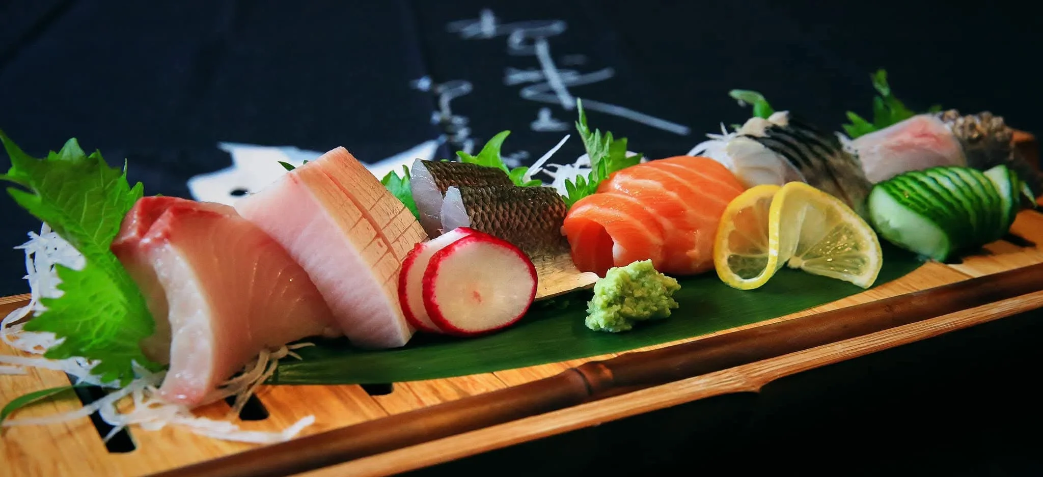 Assorted Japanese sashimi platter with fresh fish and garnishes