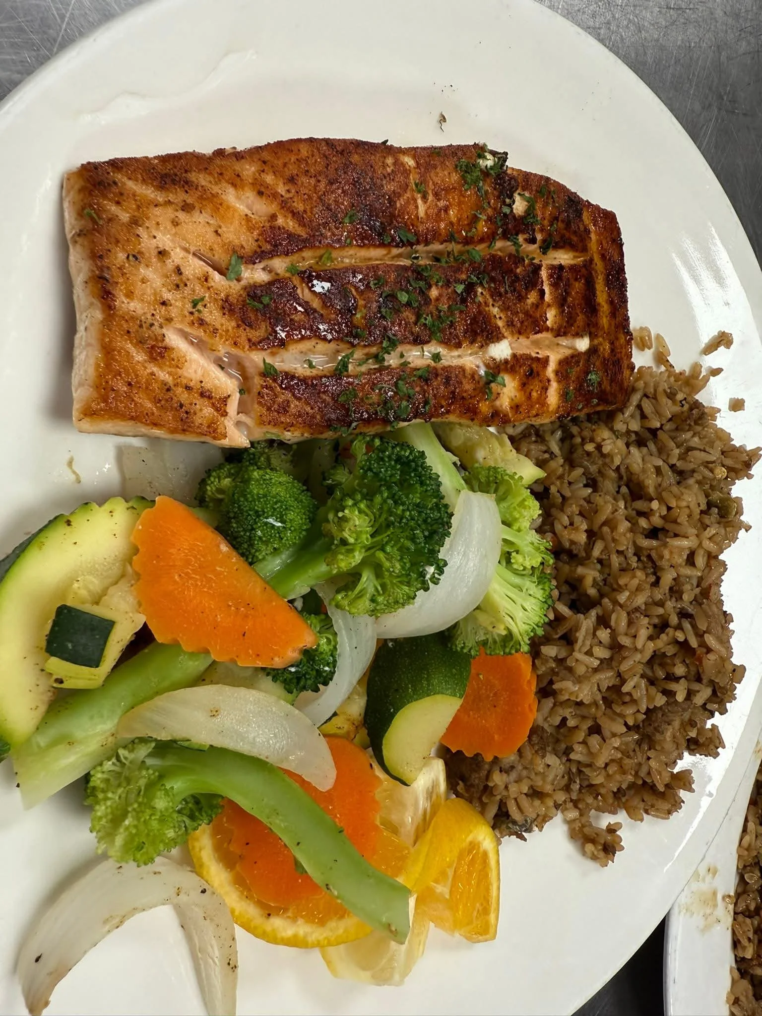 A side of rice and vegetables