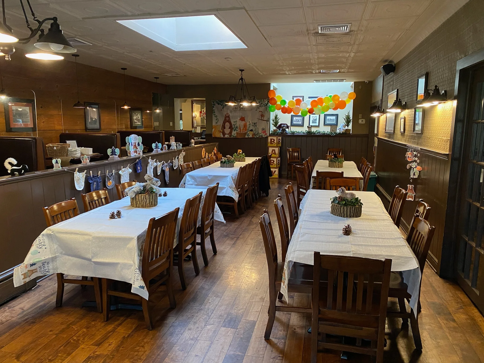 Cozy restaurant interior with wooden tables and festive decorations