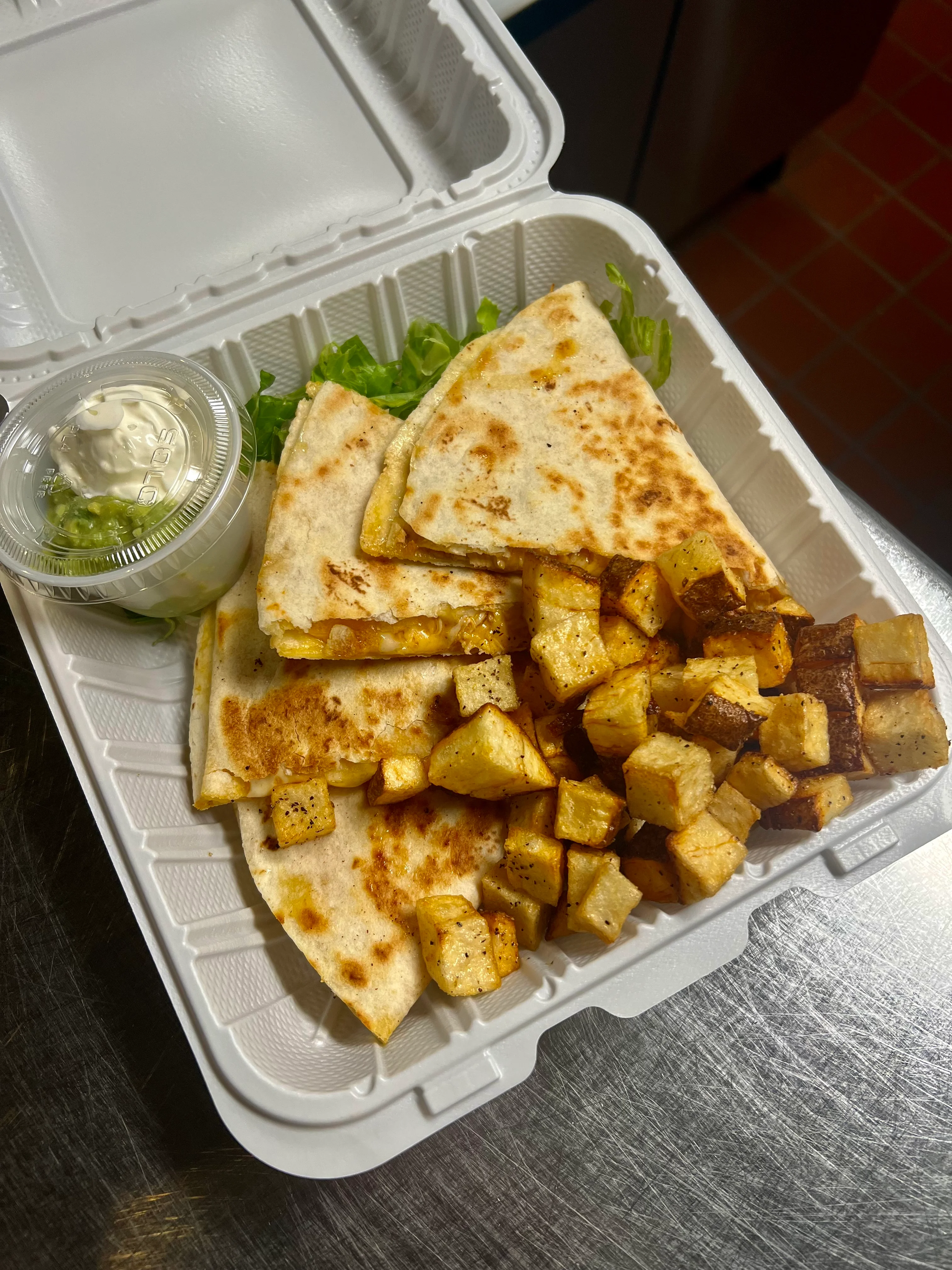 Cheesy quesadillas with seasoned potatoes