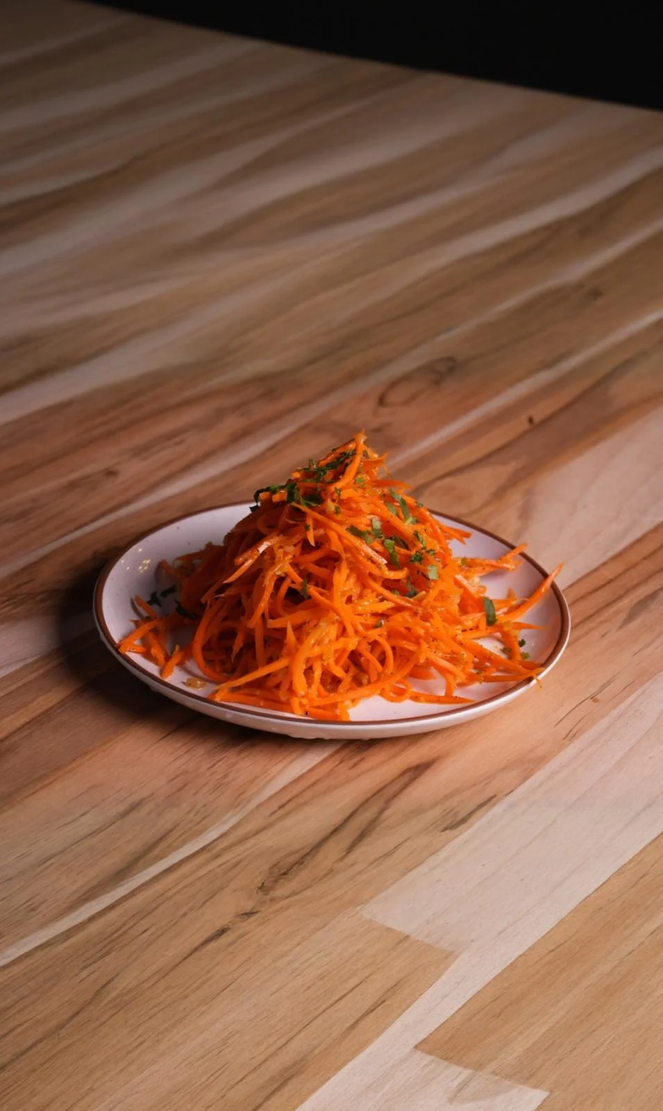Freshly prepared Korean carrot salad on a plate