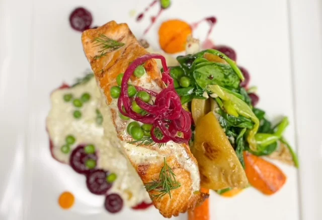 Grilled salmon with seasonal vegetables and sauce