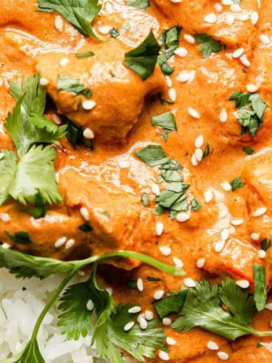 Creamy Indian butter chicken served over rice