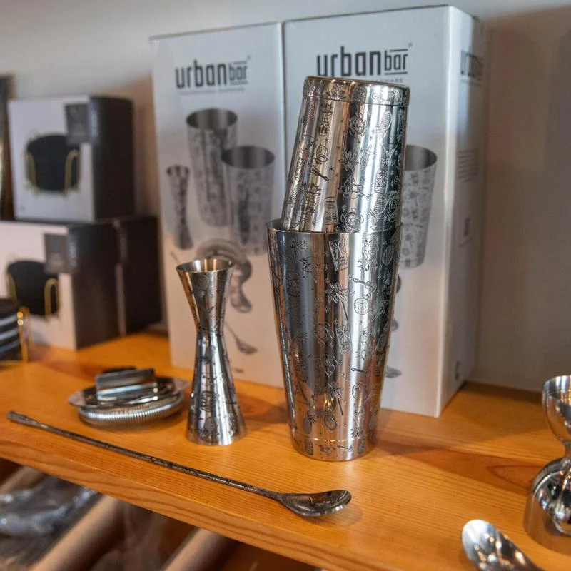 Stylish barware set including cocktail shaker and jigger on display