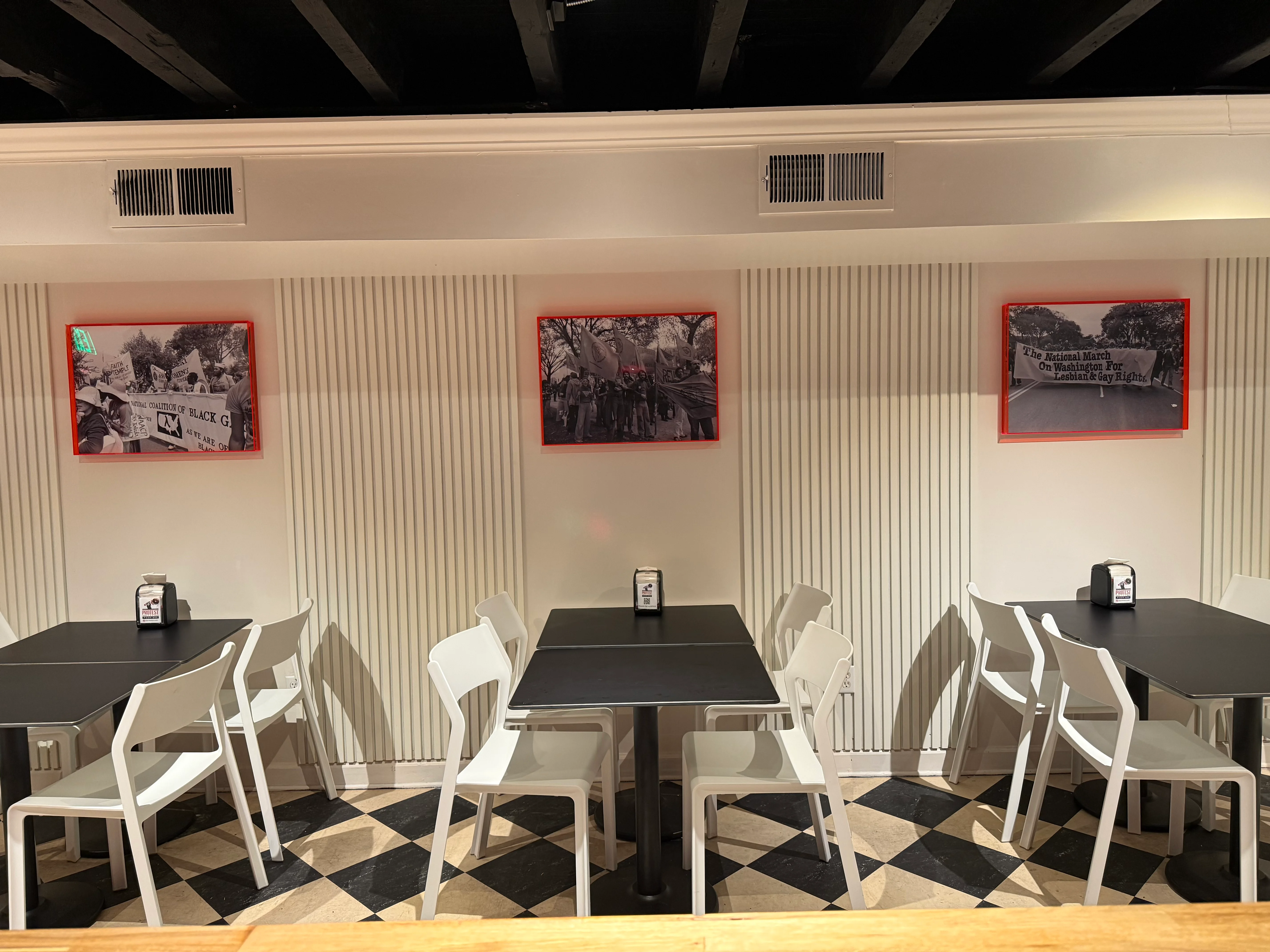 Modern restaurant interior with black and white decor