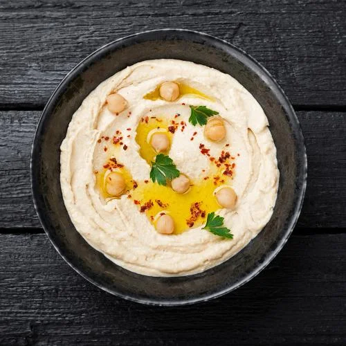 Creamy Mediterranean hummus drizzled with olive oil