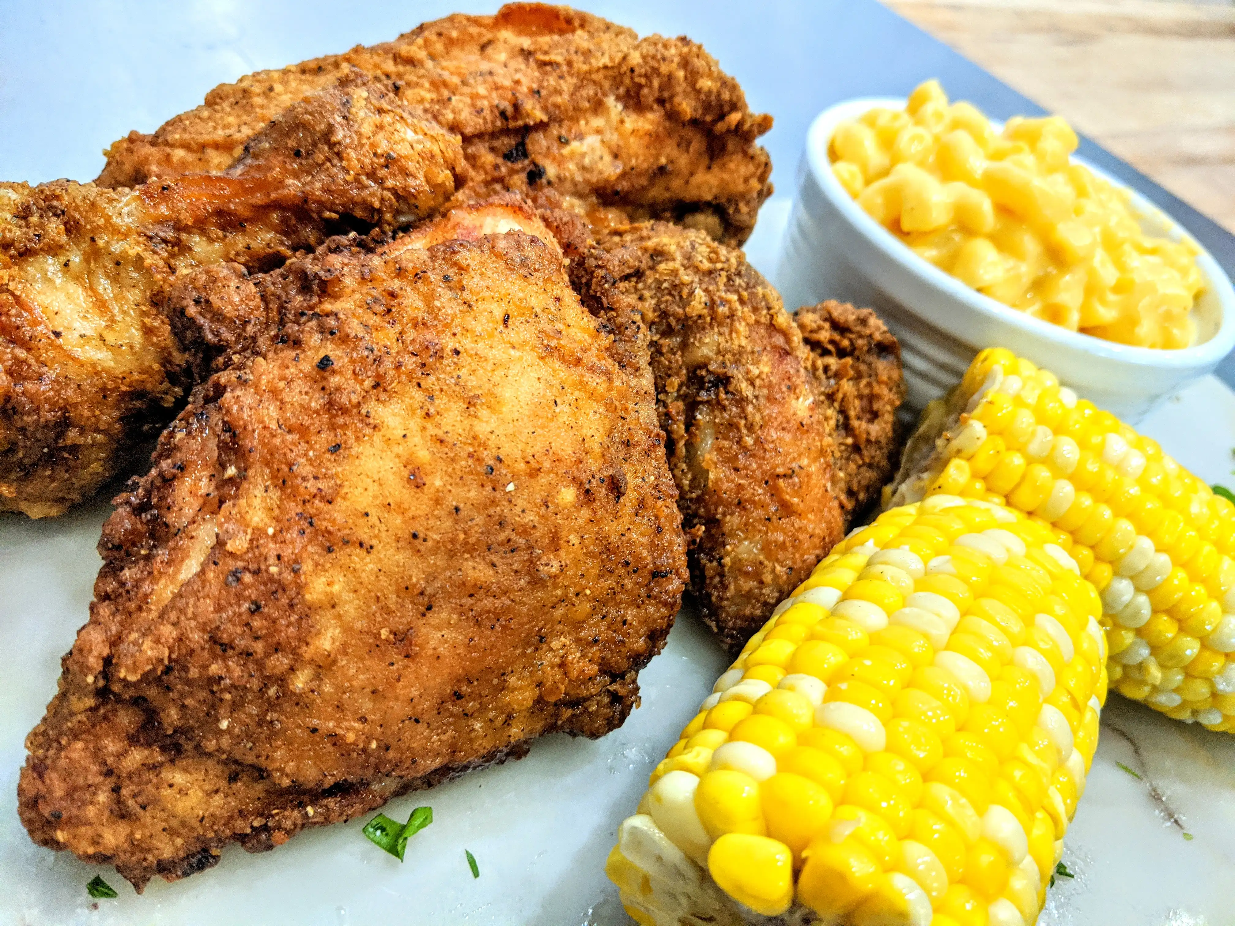 fried chicken, corn on the cob, mac and cheese