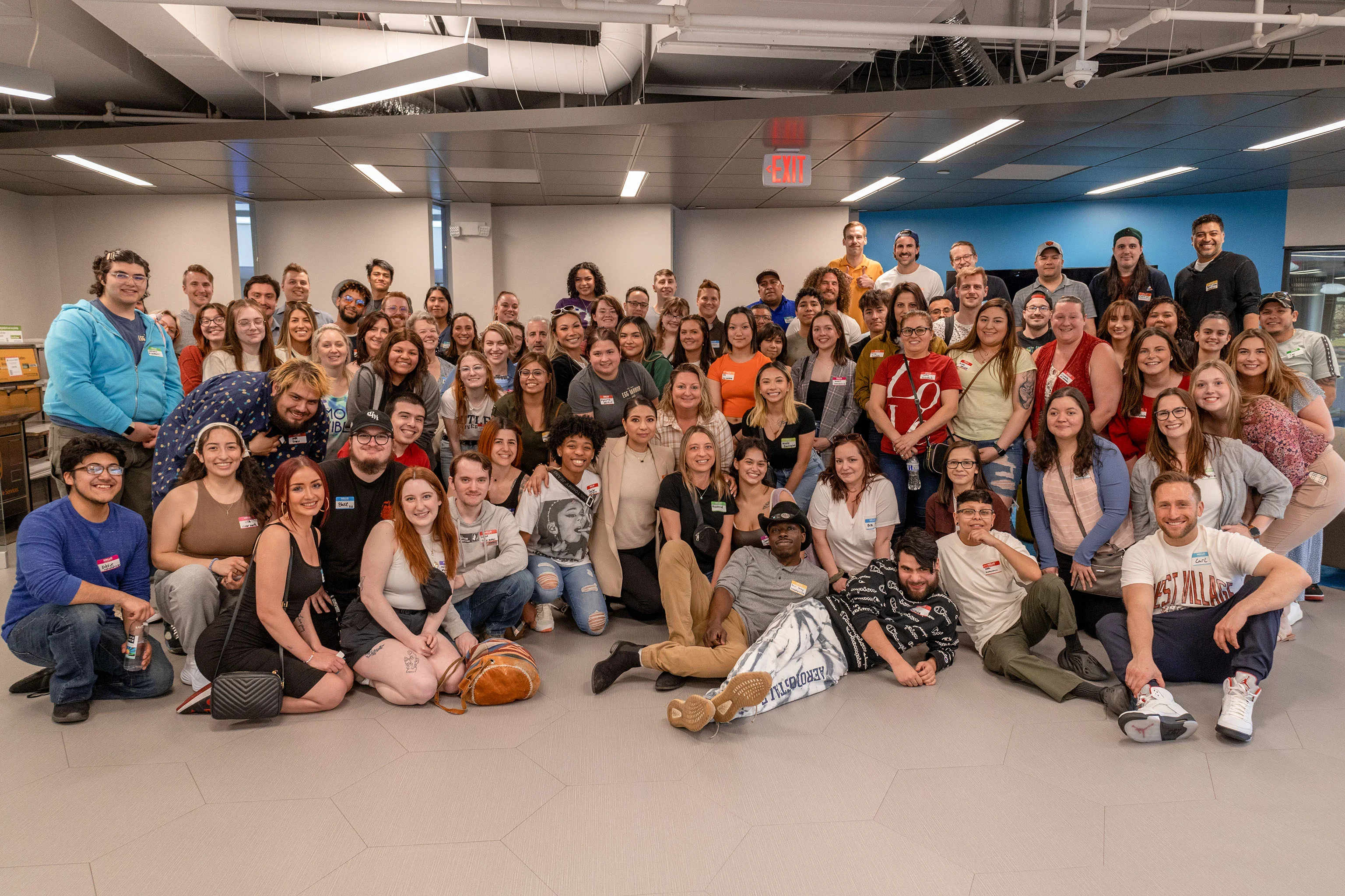 Group photo of diverse individuals at a community event