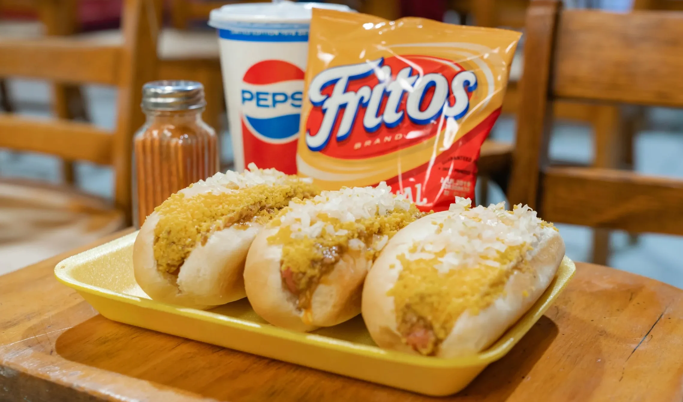 Classic American chili cheese dogs with onions